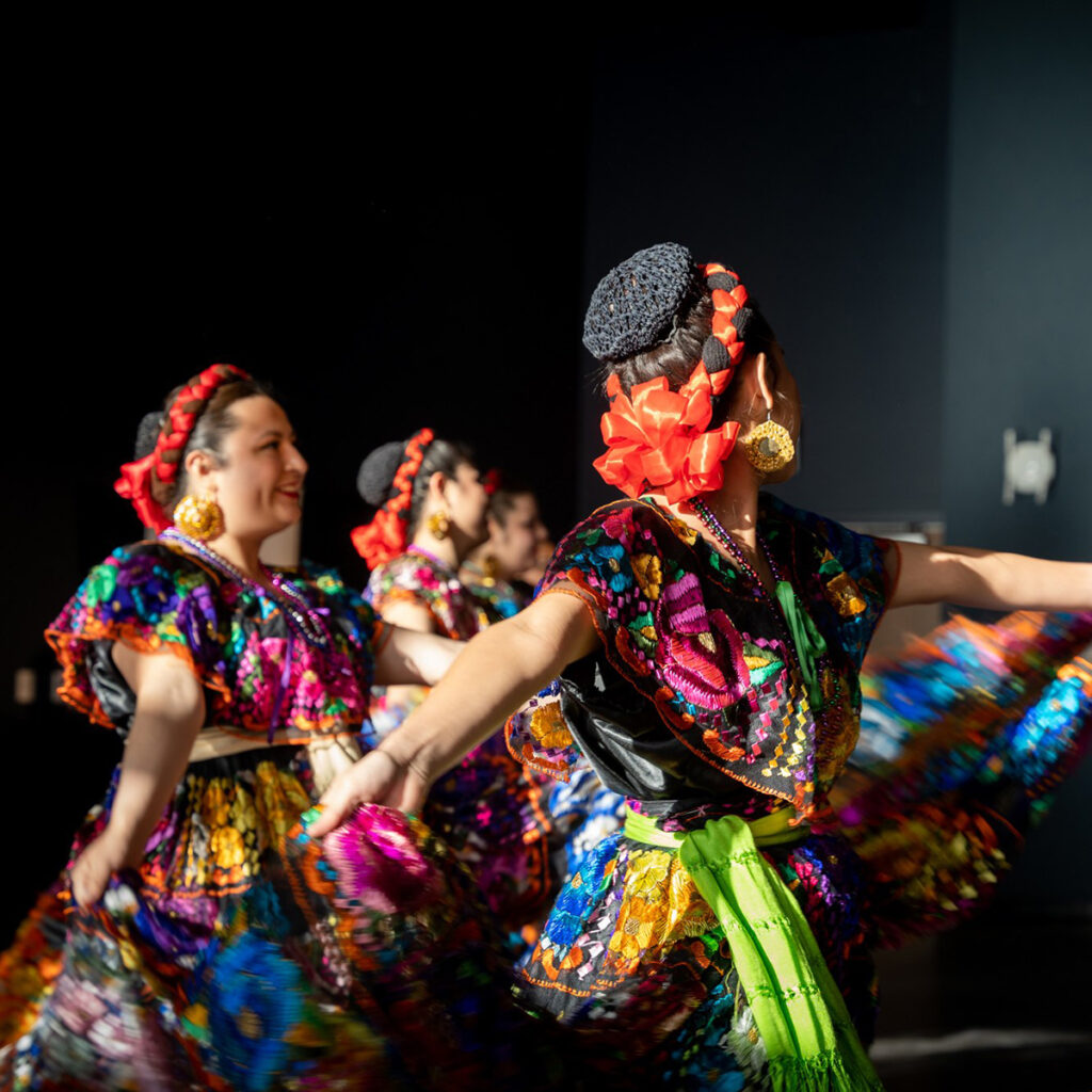 Dancers in colorful dress.