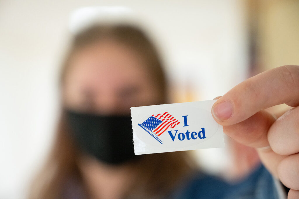 Close-up photo of an "I voted" sticker.