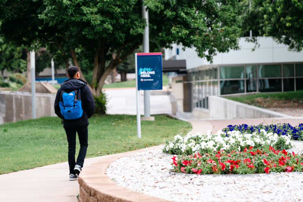 Student walks on the CSU Pueblo campus.